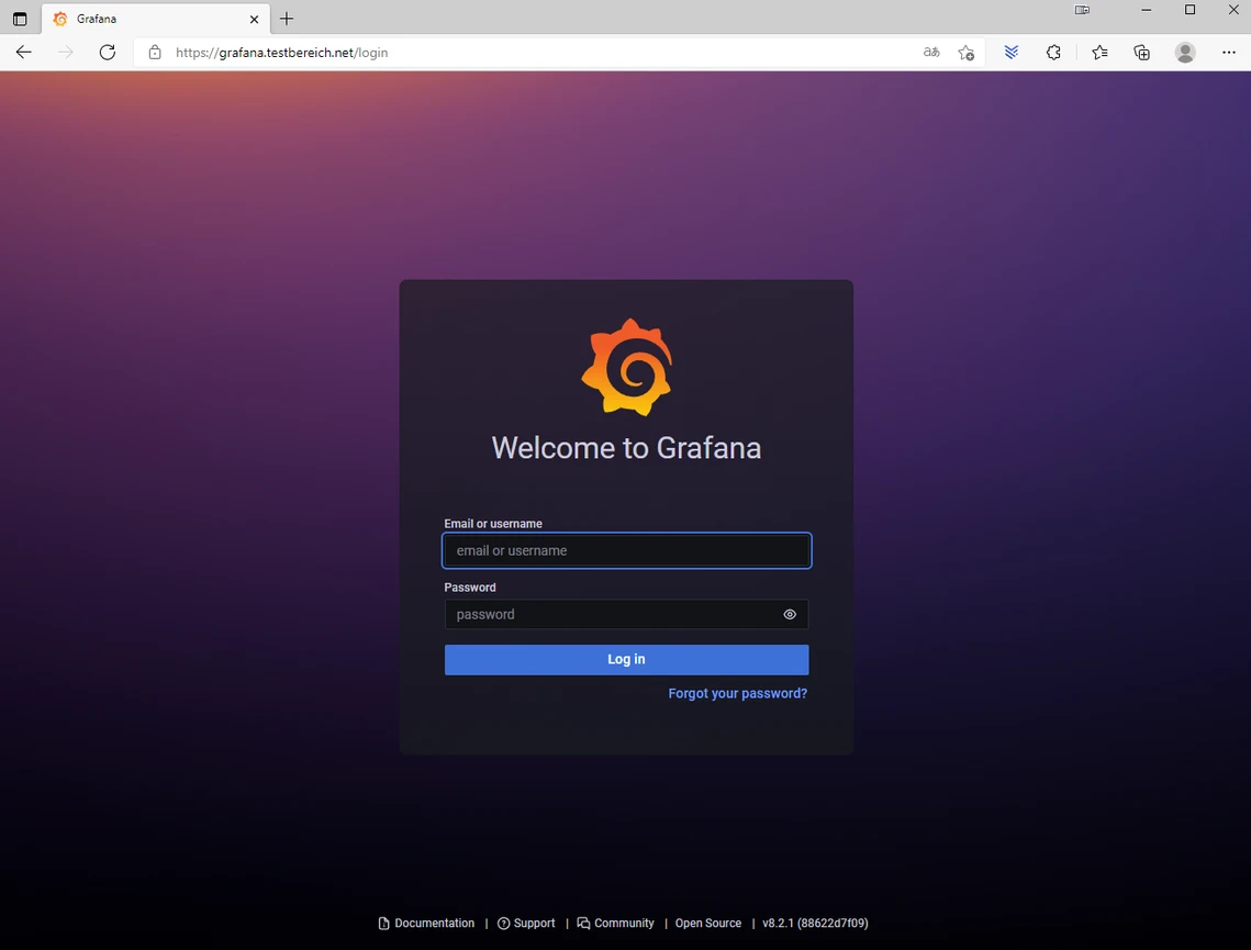 Grafana-Login: dunkles Panel mit Logo, Felder Email/Benutzername und Passwort, blauer Login-Button, gradienten Hintergrund.
