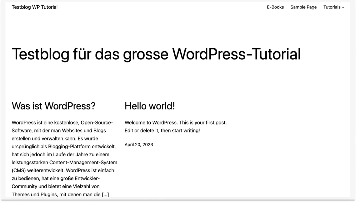 Screenshot eines Blog-Layouts mit Titel Testblog und zwei Spalten mit Was ist WordPress? und Hello world!