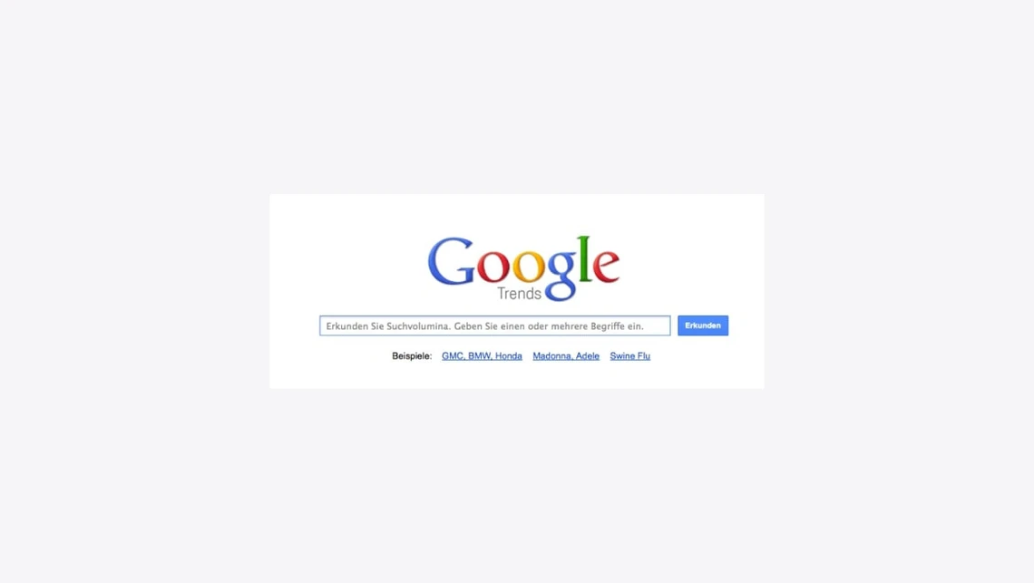 Weißer Hintergrund, zentriertes Google Trends-Logo, darunter Suchleiste und blaue Links.